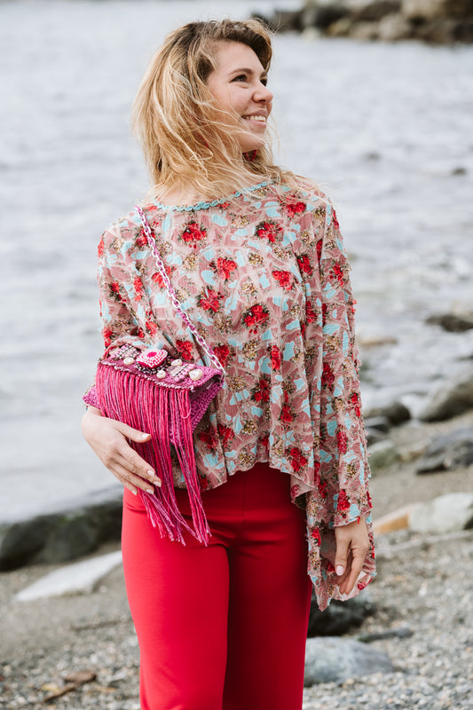 Poncho in jersey fantasia floreale in rilievo - Jersey poncho with embossed floral pattern